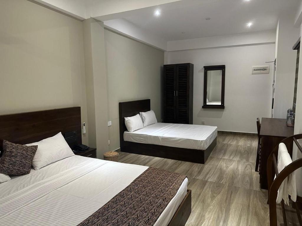 Deluxe Triple Room